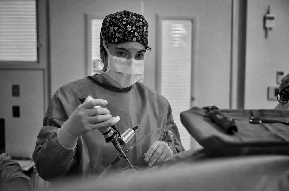 Falon Sonnen, PA-C, assisting in surgery